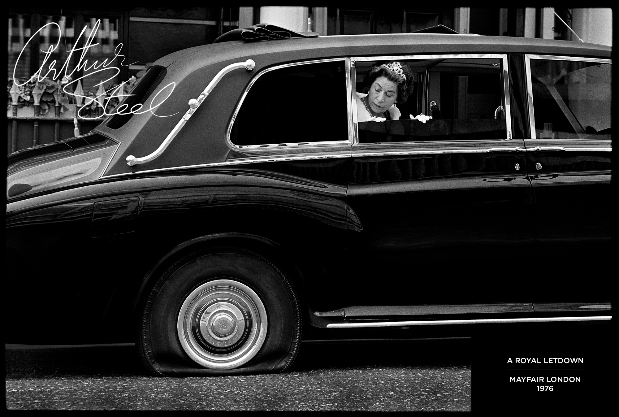 queen lookalike flat tyre black and white photograph royal letdown