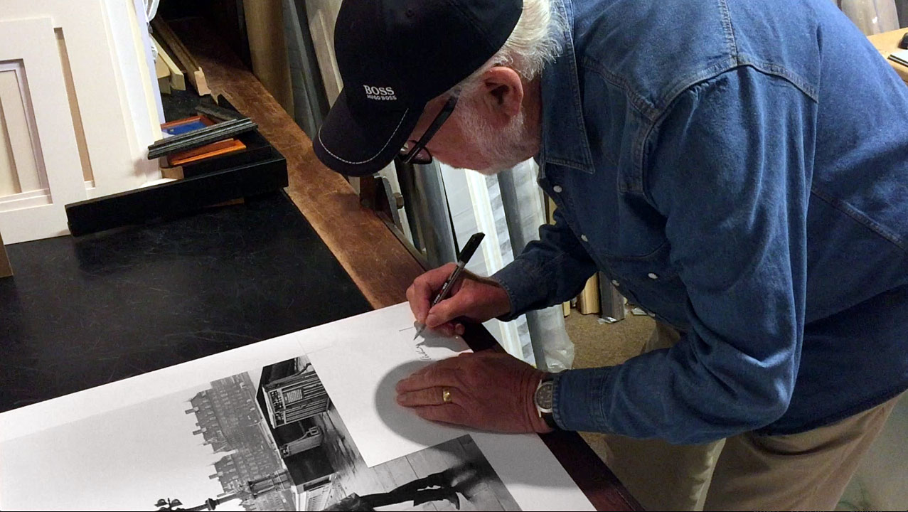 arthur steel signing a black and white photographic print