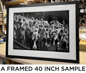 an exclusive black and white photograph of the upper classes watching a horse race at royal ascot by british photojournalist arthur steel