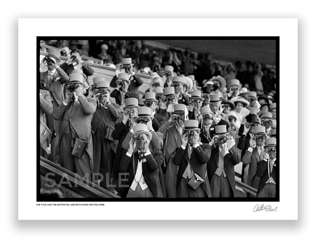 an exclusive black and white photograph of the upper classes watching a horse race at royal ascot by british photojournalist arthur steel