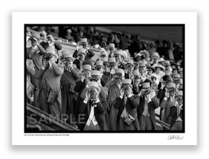 an exclusive black and white photograph of the upper classes watching a horse race at royal ascot by british photojournalist arthur steel