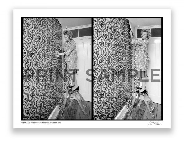 margaret thatcher is photographed wallpapering by award winning photojournalist arthur steel